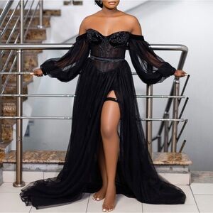 Black costume robe, with Swarovski stones and corset. doesn’t come with garter.